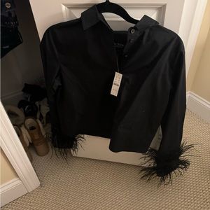 JCrew shirt with feathers